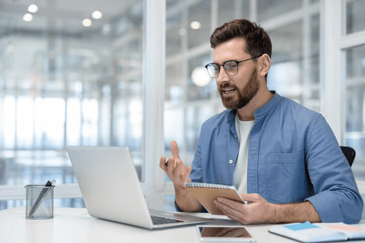 A budding real estate agent taking a real estate salesperson program online