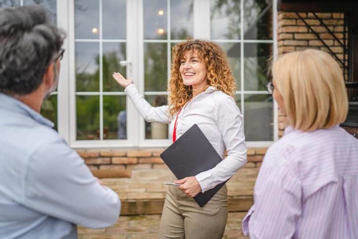 A Real Estate Salesperson Program graduate guiding both buyer and seller through a transaction