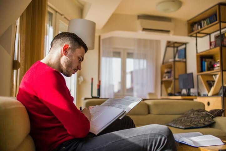 A real estate agent reviewing property documents