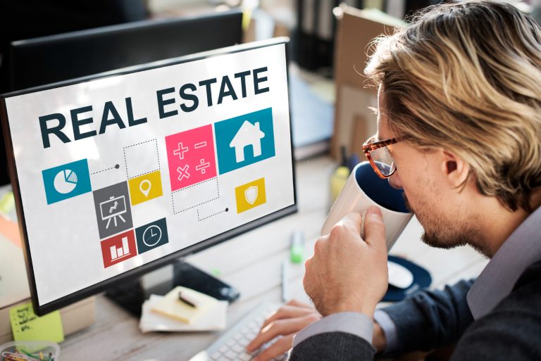 person thinking about real estate school